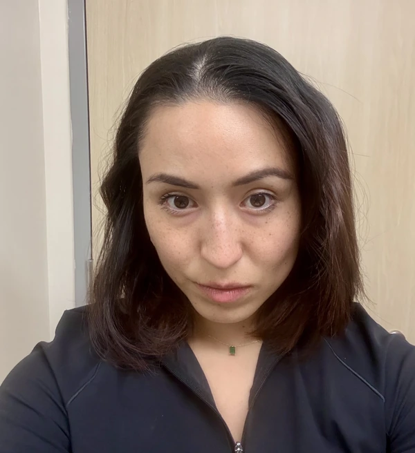 A shoulder-length brunette bob, photographed from the front